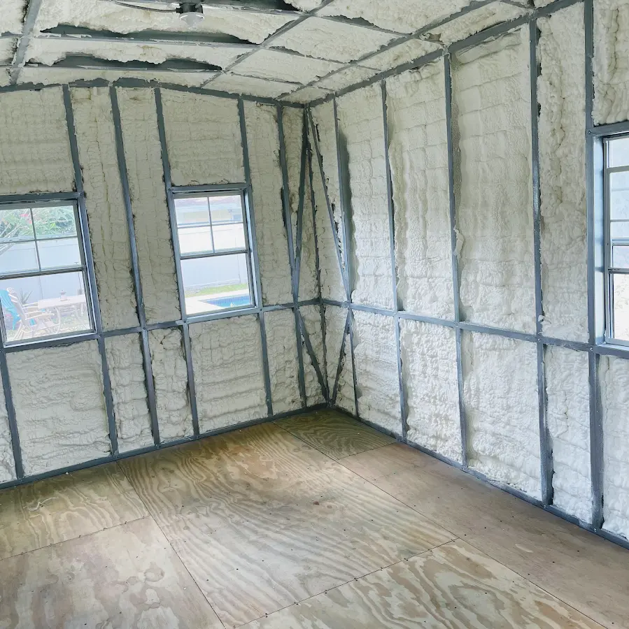 Closed-cell spray foam insulation applied to wall cavities in a residential project in Fern Park